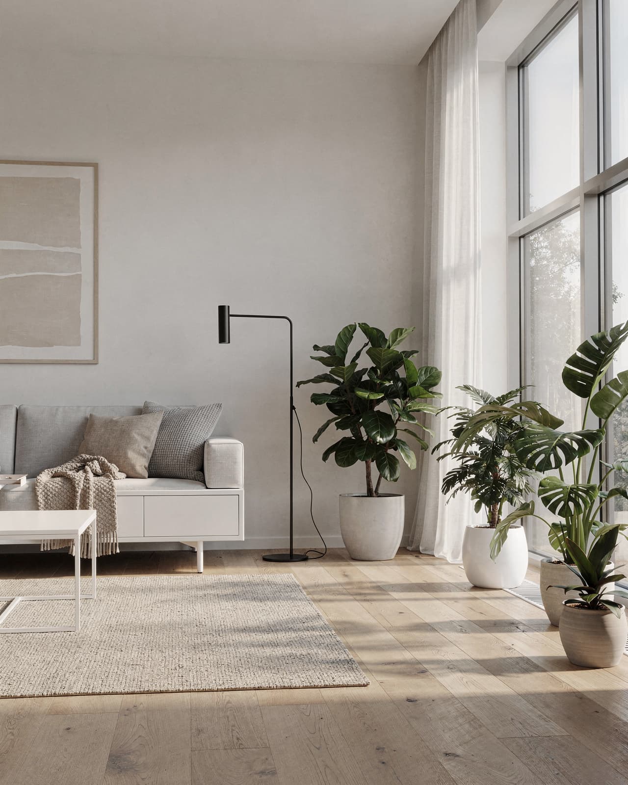 A minimalist Scandinavian living room with warm wooden floors, sleek white furniture, large windows letting in natural light, and green indoor plants for a cozy touch.